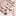 Gold and silver necklaces with moon and star charms on a pink background-3